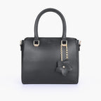 Black handbag with flower charm