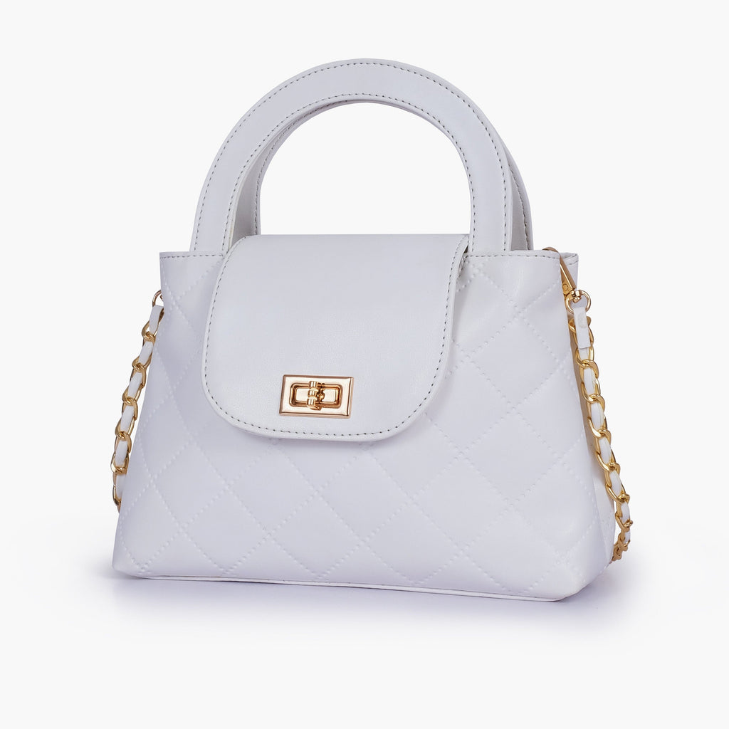 White flap quilted bag with top handle