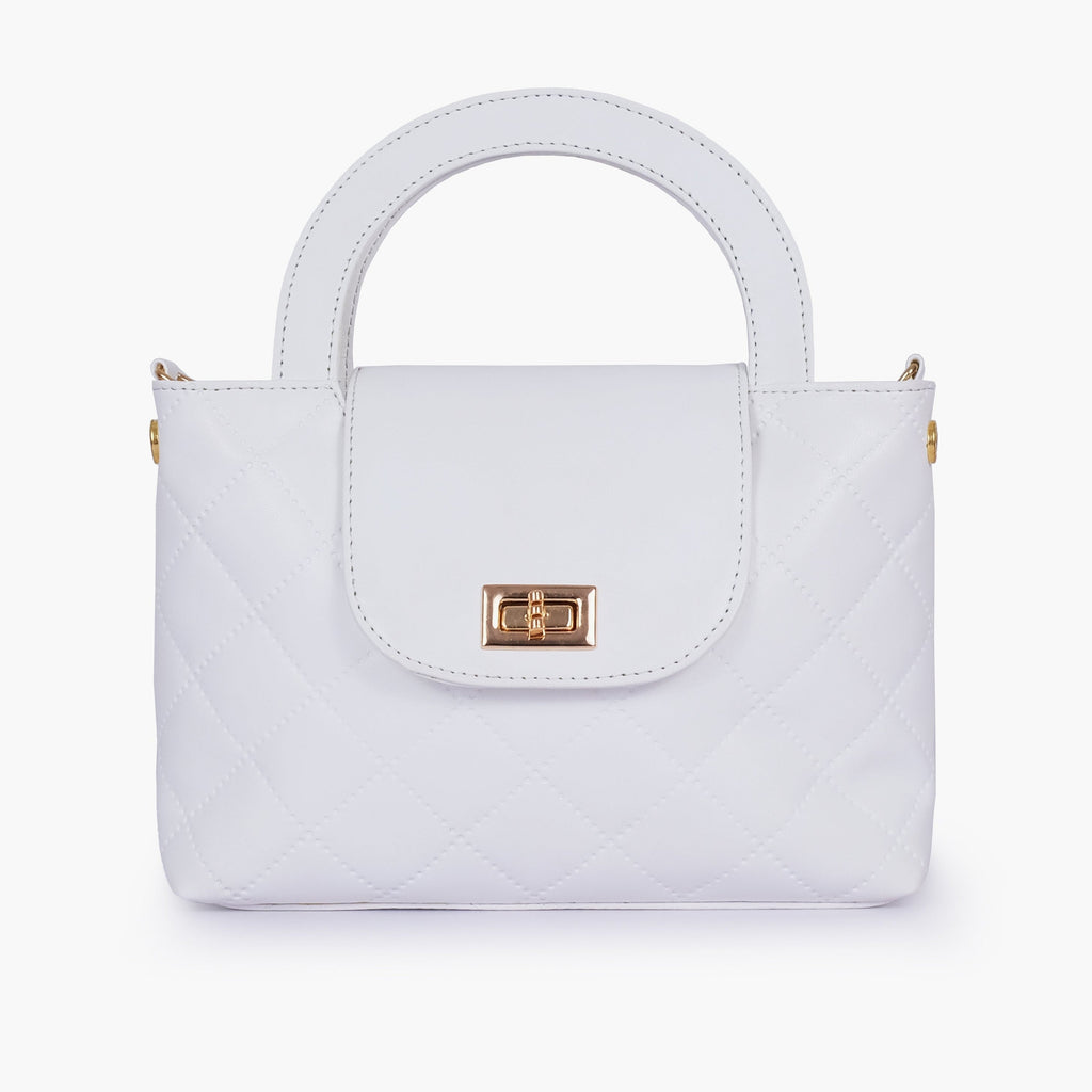 White flap quilted bag with top handle