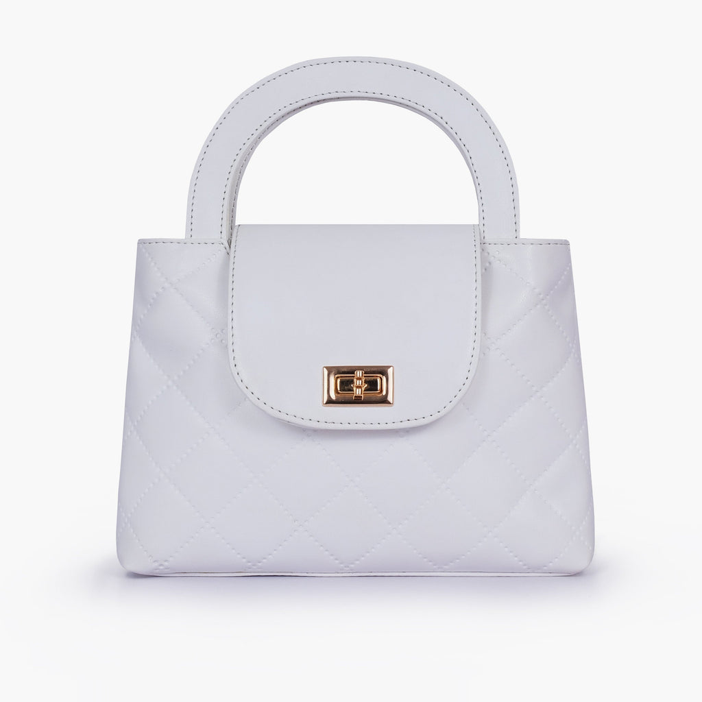 White flap quilted bag with top handle