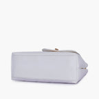 White flap quilted bag with top handle