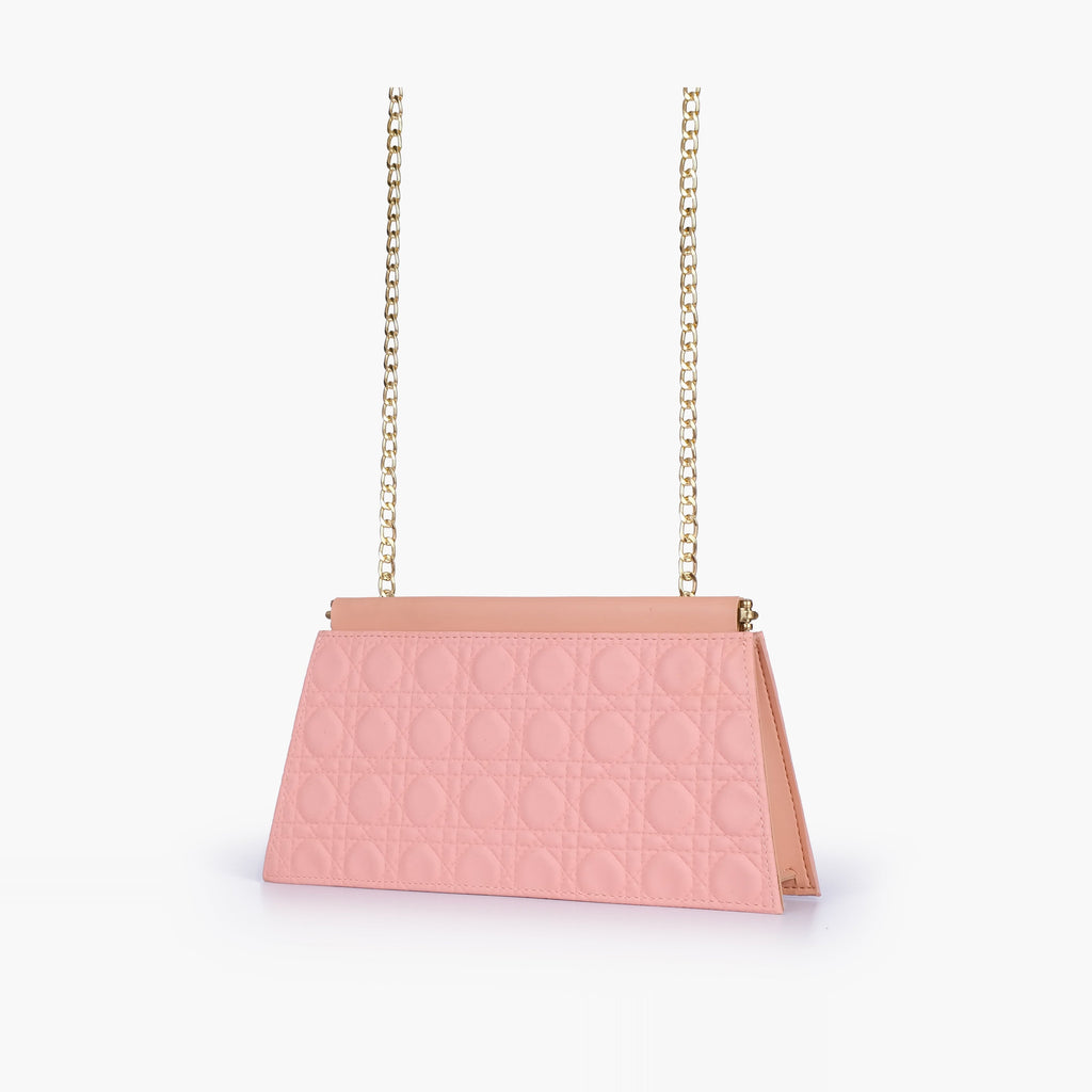 Peach quilted evening clutch with snap closure