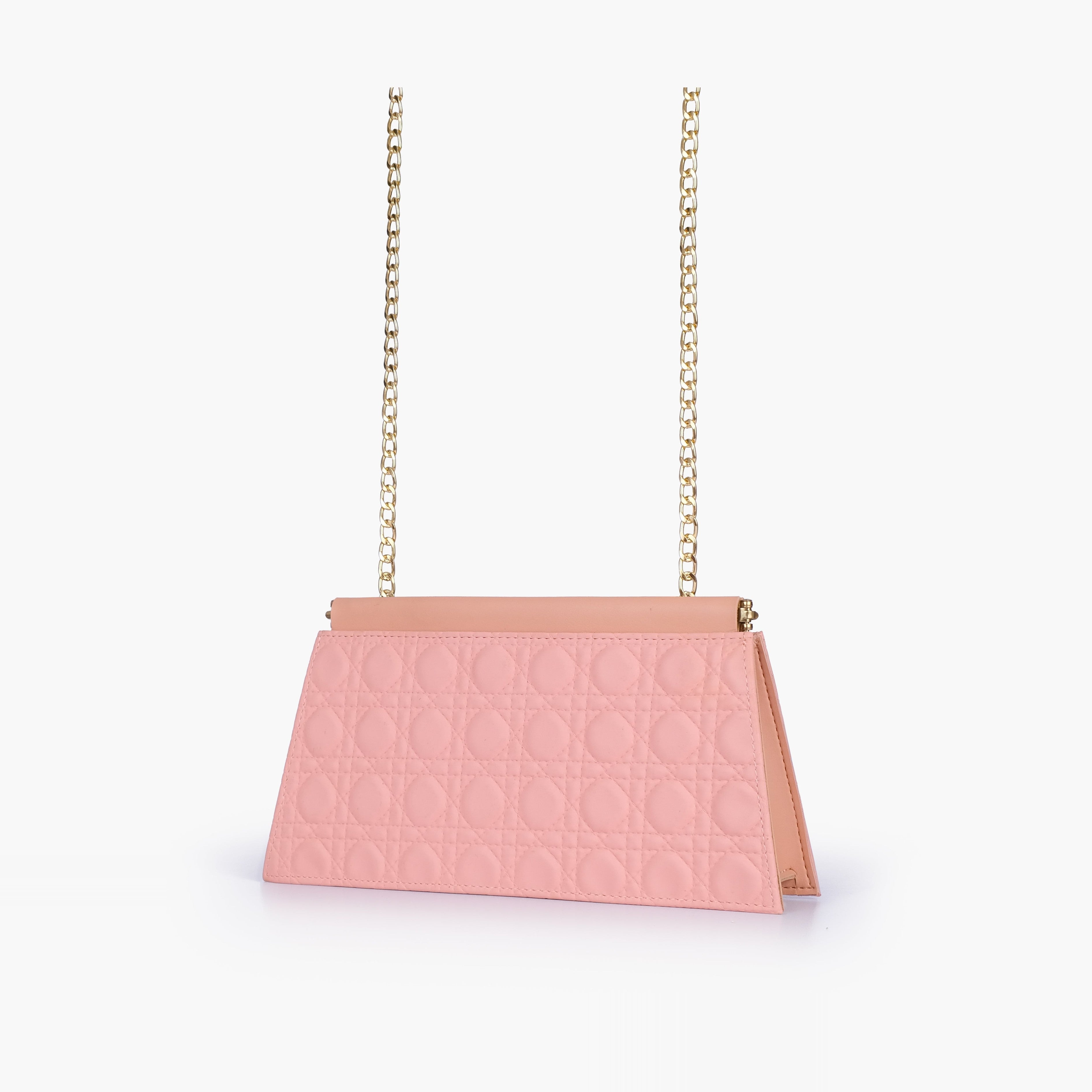 Peach quilted evening clutch with snap closure