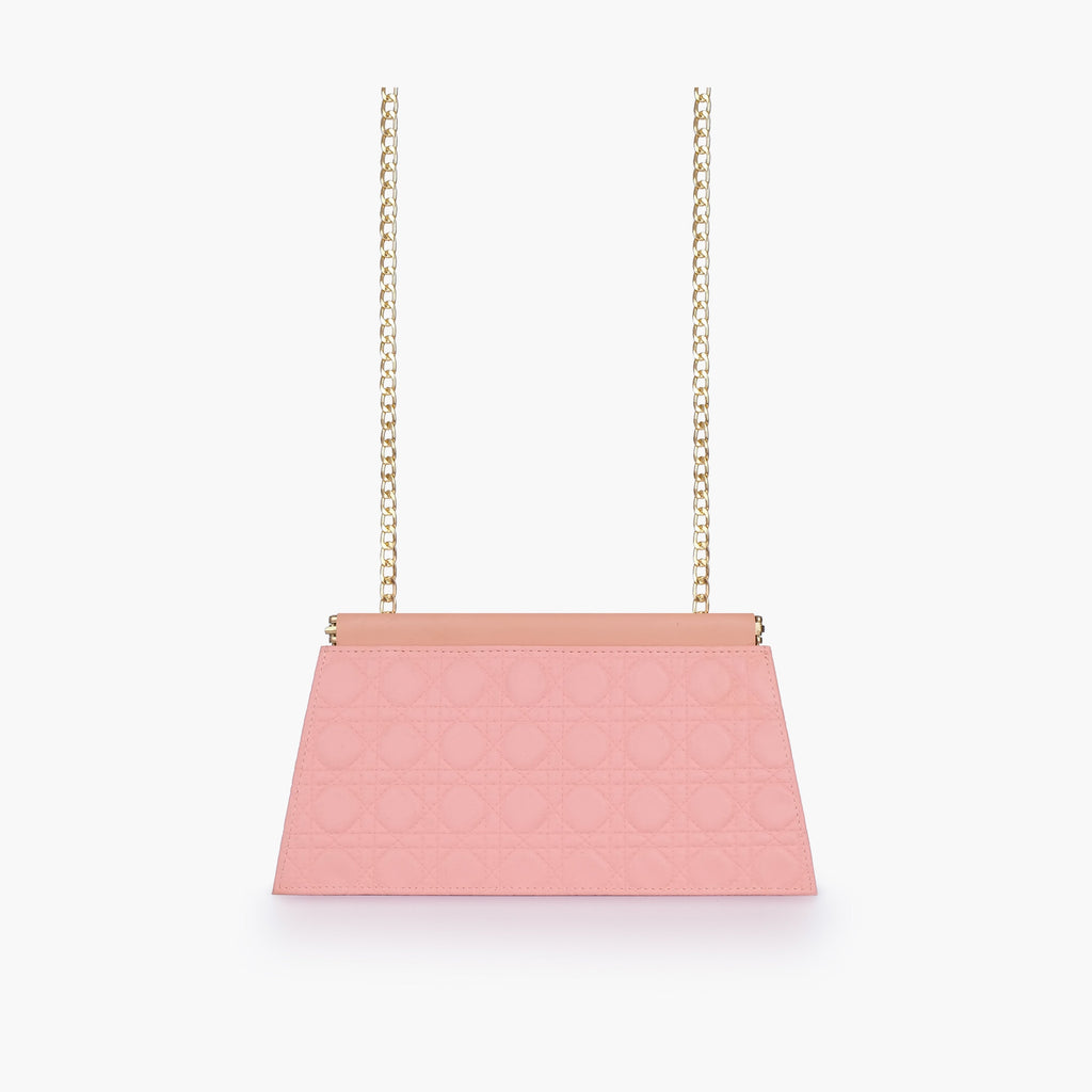Peach quilted evening clutch with snap closure