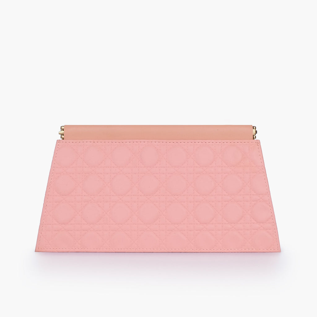 Peach quilted evening clutch with snap closure