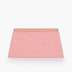 Peach quilted evening clutch with snap closure