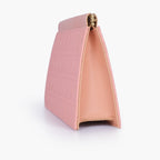 Peach quilted evening clutch with snap closure
