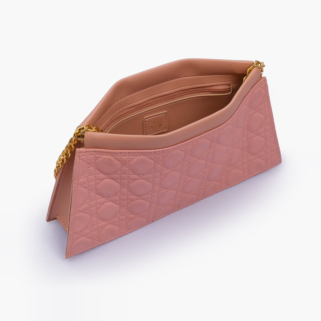 Peach quilted evening clutch with snap closure