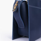 Blue trapeze top-handle bag
