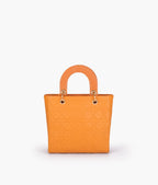 Orange quilted mini tote bag